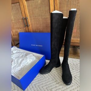 Brand new, never worn Stuart Weitzman black suede city boots. Size 7.